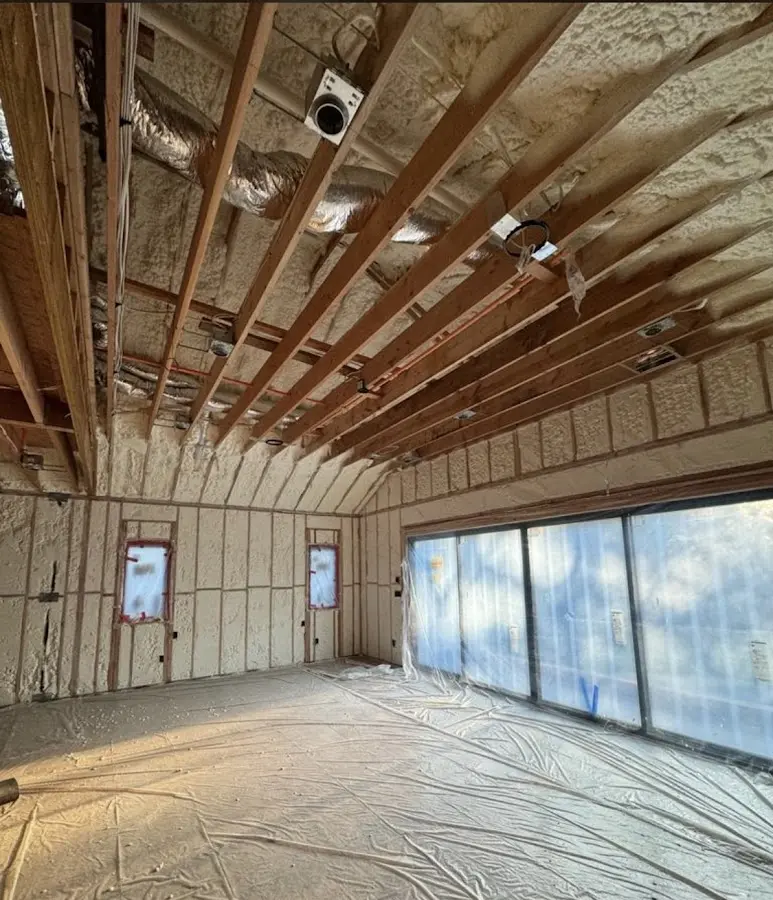 Interior walls and ceiling insulated with spray foam during new construction in Marshall